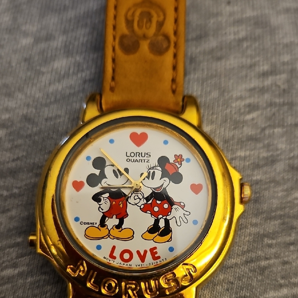 Lorus' Disney Mickey & Minnie Musical watch. Goldtone W/  Brown Leather Band